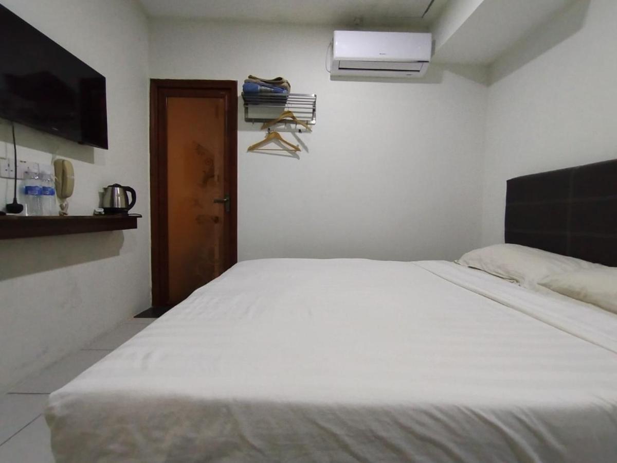 Super Oyo 90668 Joy Inn Miri Exterior foto